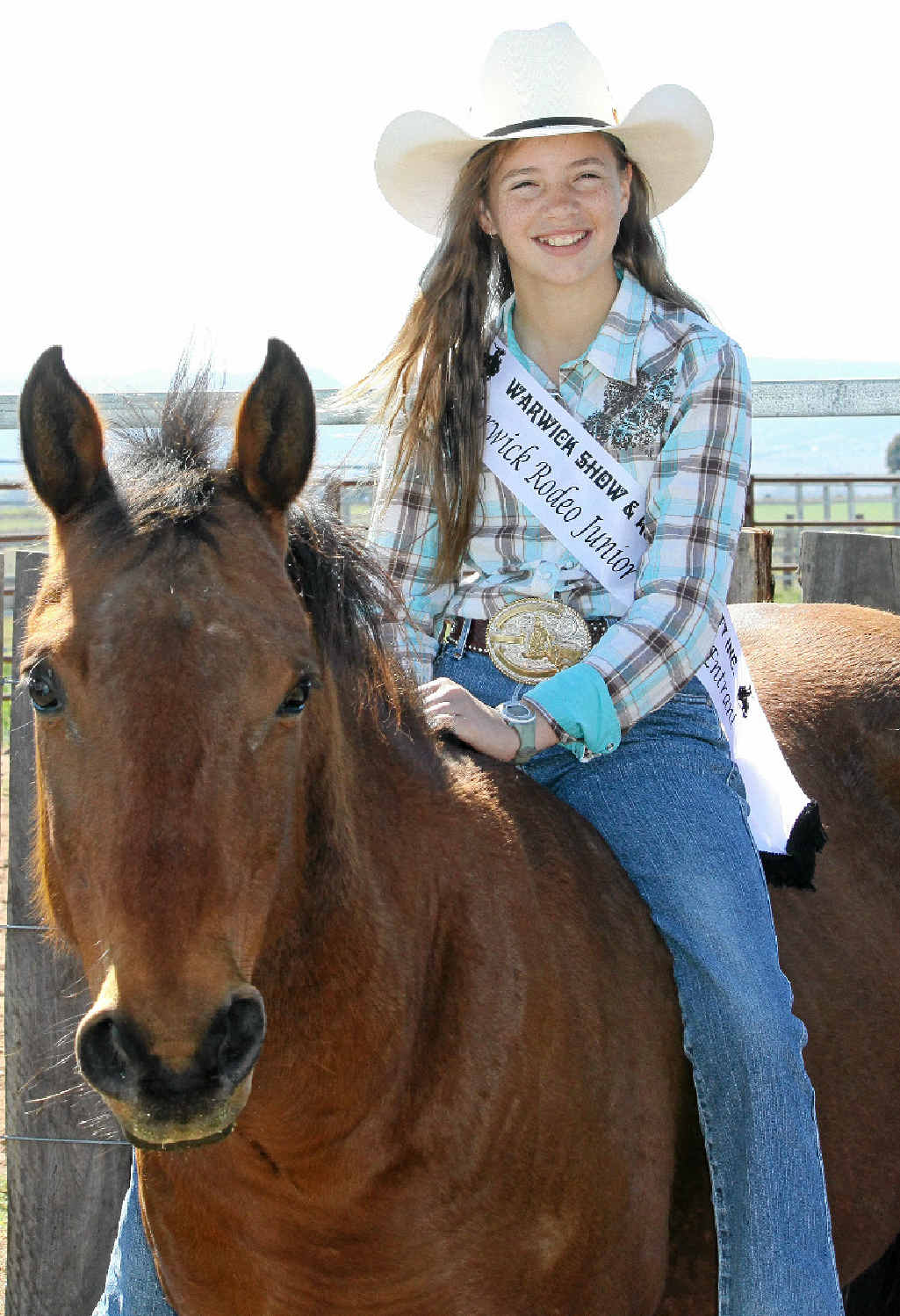 LOVE THE RIDE: Jacqui Richmond-Clay, 13, is an entrant in the Warwick Rodeo Junior Cowgirl Quest on a horse called Mouse, owned by her mentor, 2013 Warwick Rodeo Princess Sophie Amos.